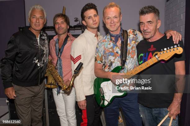 Martin Kemp , Steve Norman, Ross William Wild, Gary Kemp and John Keeble of Spandau Ballet back stage before the show at Subterania on June 6, 2018...