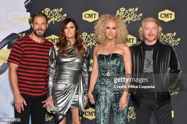 Jimi Westbrook, Karen Fairchild, Kimberly Schlapman and Philip Sweet of musical group Little Big Town attends the 2018 CMT Music Awards at...