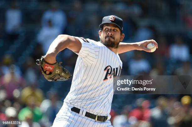 Brad Hand of the San Diego Padres pitches during the ninth inning of a baseball game against the Atlanta Braves at PETCO Park on June 6, 2018 in San...