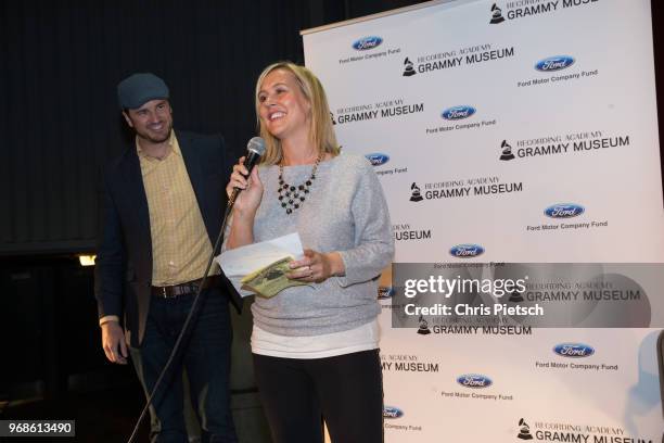 The GRAMMY Museum's Patrick Lundquist and Amy Newport with Kendall Ford of Eugene during a presentation of the GRAMMY Signature Schools Enterprise...