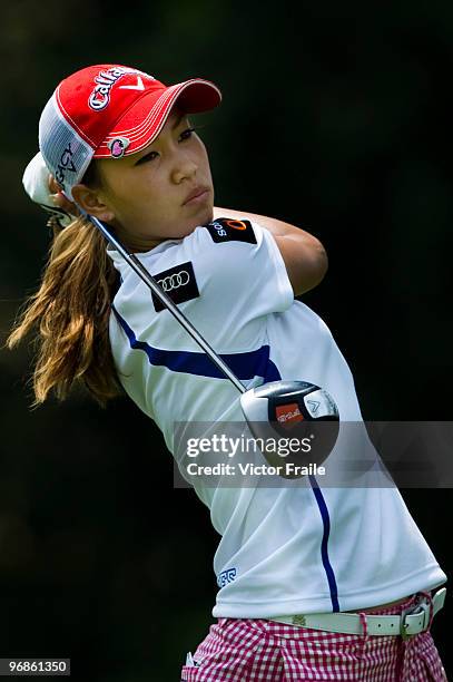 Momoko Ueda of Japan tees off on the 9th hole during round two of the Honda LPGA Thailand at the Siam Country Club on February 19, 2010 in Chon Buri,...