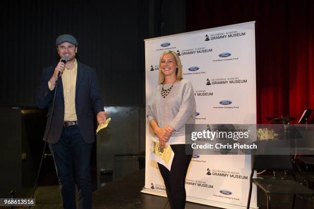 The GRAMMY Museum's Patrick Lundquist and Amy Newport with Kendall Ford of Eugene during a presentation of the GRAMMY Signature Schools Enterprise...