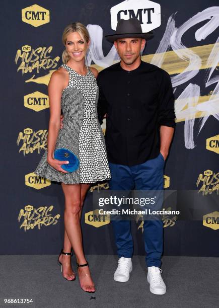 Katherine Stephans and Billy Dec attend the 2018 CMT Music Awards at Bridgestone Arena on June 6, 2018 in Nashville, Tennessee.