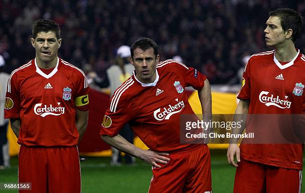 Steven Gerrard,Jamie Carragher and Daniel Agger in the pre match team line up during the UEFA Europa League Round 32 first leg match between...