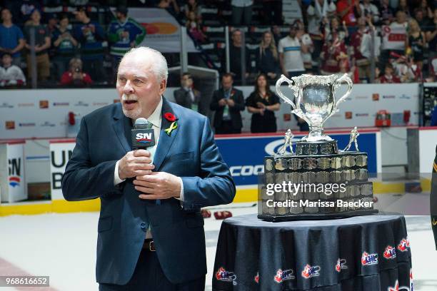 President David Branch speaks to players on the ice prior to presenting the Memorial Cup trophy to the Acadie-Bathurst Titan after the win against...