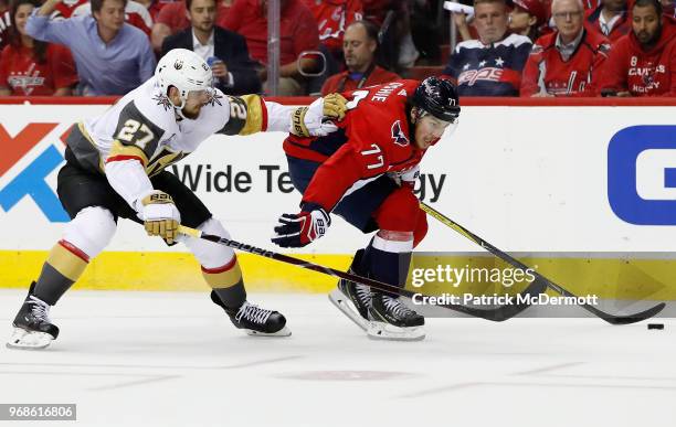 Oshie of the Washington Capitals plays against Shea Theodore of the Vegas Golden Knights during Game Four of the 2018 NHL Stanley Cup Final at...