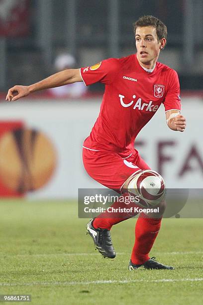 Wout Brama of Enschede runs with the ball during the UEFA Europa League knock-out round, first leg match between FC Twente Enschede and SV Werder...