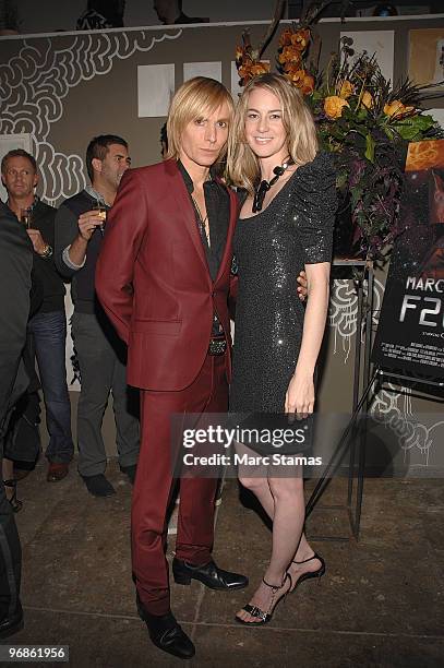 Designer Marc Bouwer and Guest attend a special screening of Marc Bouwer's "Fall Winter 2010" at the Leo Kesting Gallery on February 18, 2010 in New...