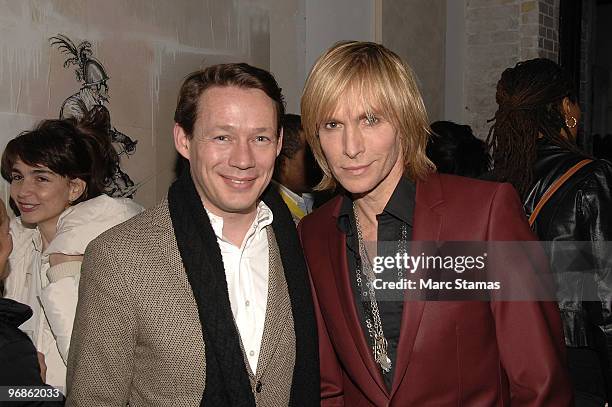Designer Marc Bouwer and guest attend a special screening of Marc Bouwer's "Fall Winter 2010" at the Leo Kesting Gallery on February 18, 2010 in New...