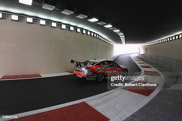 Craig Lowndes drives the TeamVodafone Holden during qualifying for round one of the V8 Supercar Championship Series at Yas Marina Circuit on February...