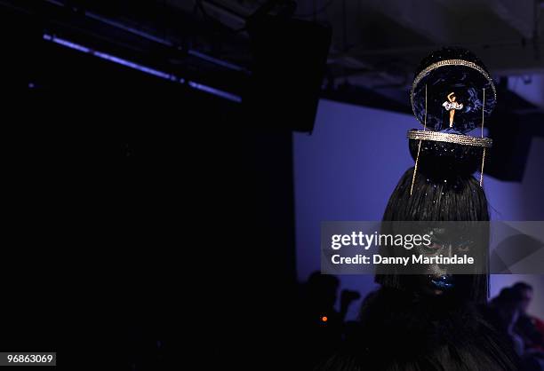 Model walks the runway at the Charlie Le Mindu show for London Fashion Week Autumn/Winter 2010 at On|Off on February 19, 2010 in London, England.