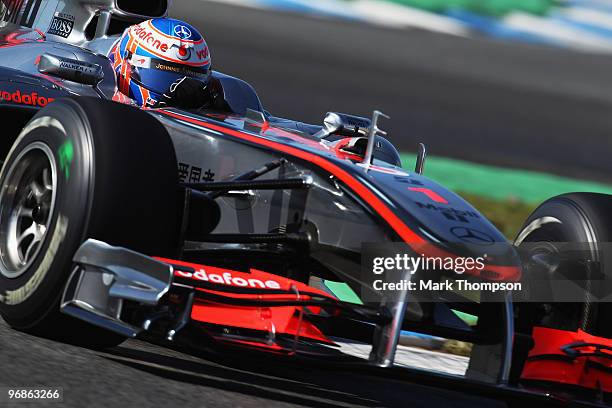 Jenson Button of Great Britain and McLaren Mercedes drives during winter testing at the Circuito De Jerez on February 19, 2010 in Jerez de la...