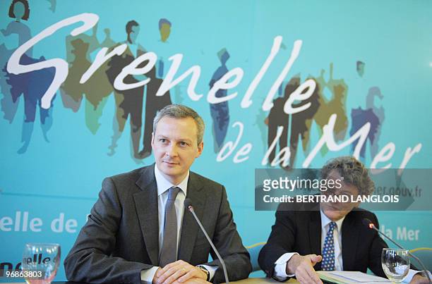 French Ecology and sustainable development minister Jean-Louis Borloo , Agriculture, Food and Fisheries minister Bruno le Maire give a press...