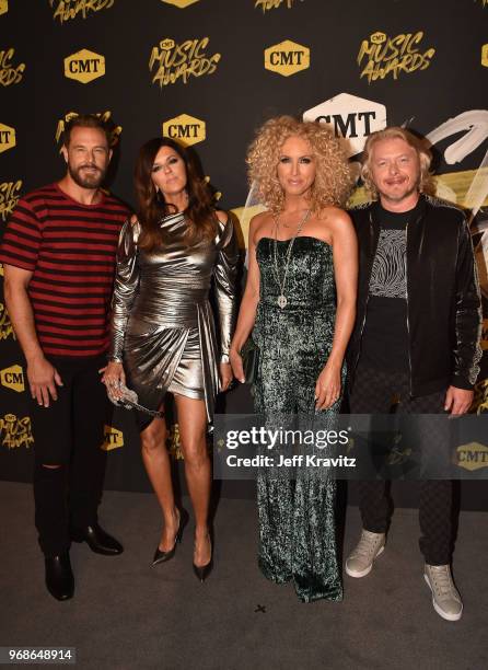 Jimi Westbrook, Karen Fairchild, Kimberly Schlapman and Phillip Sweet of Little Big Town attend the 2018 CMT Music Awards at Nashville Municipal...