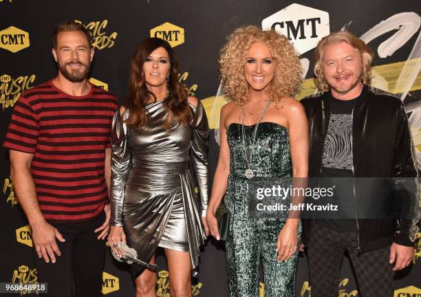 Jimi Westbrook, Karen Fairchild, Kimberly Schlapman and Phillip Sweet of Little Big Town attend the 2018 CMT Music Awards at Nashville Municipal...