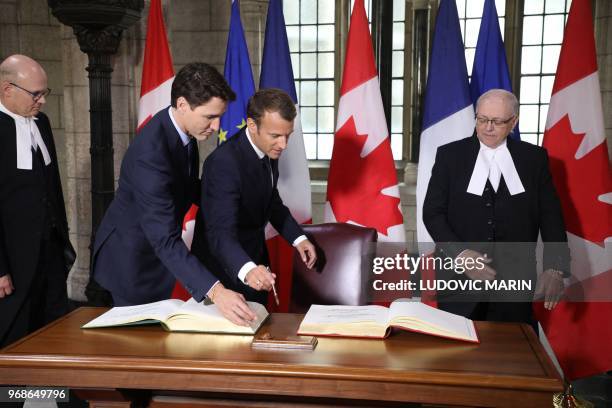 Canadian Prime Minister Justin Trudeau welcomes French President Emmanuel Macron at Parliament on June 6, 2018 in Ottawa.