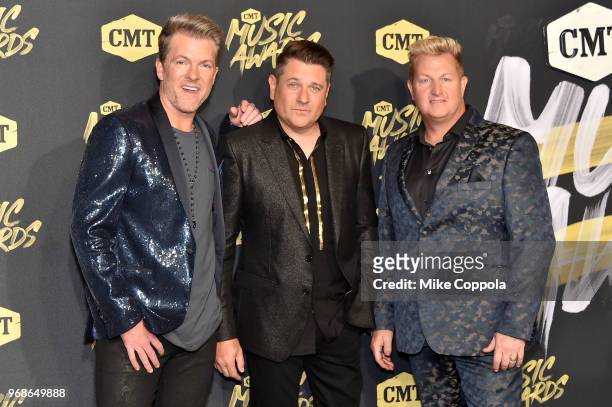 Joe Don Rooney, Jay DeMarcus, and Gary LeVox of Rascal Flatts attend the 2018 CMT Music Awards at Bridgestone Arena on June 6, 2018 in Nashville,...