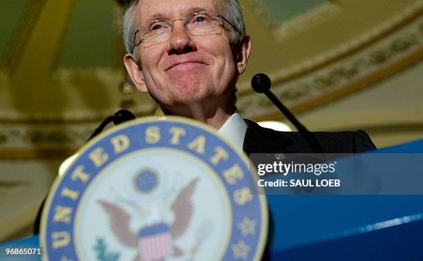 Senate Majority Leader Senator Harry Reid speaks on pending legislation during a press conference at the US Capitol in Washington, DC, February 11,...