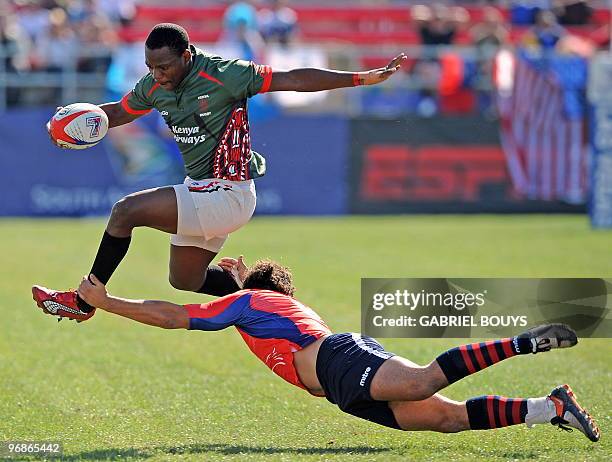 Brian Nyikuli of Kenya is tackled by Tomas Olave of Chile during the 2010 USA Rugby Sevens tournament at the Sam Boyd Stadium in Las Vegas, Nevada on...