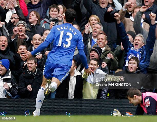 Chelsea's German midfielder Michael Ballack celebrates scoring Chelsea's second goal during the FA Cup fifth round football match between Chelsea and...