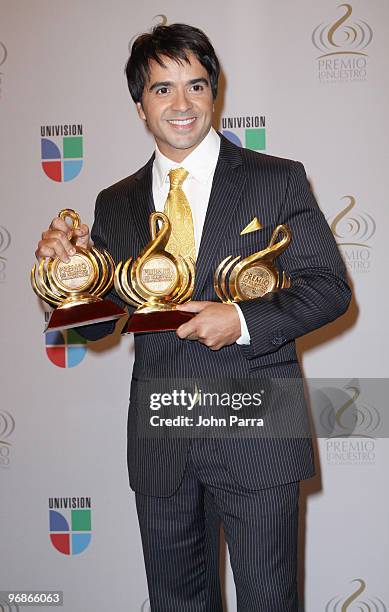Luis Fonsi poses in the press room at Univisions 2010 Premio Lo Nuestro a La Musica Latina Awards at American Airlines Arena on February 18, 2010 in...