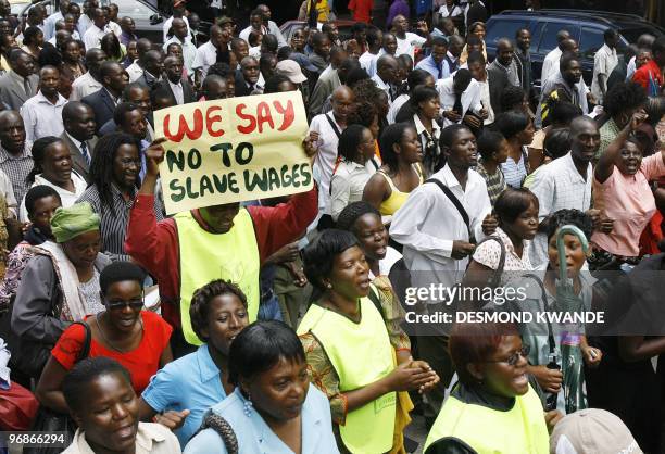 Zimbabwean civil servants demonstrate in the streets of Harare on February 19, 2009. Teachers and other civil servants have been on strike for the...