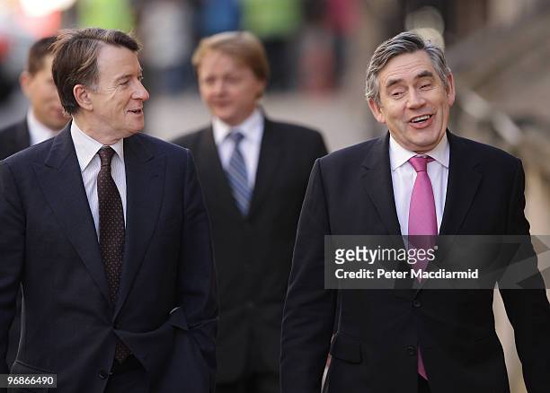 Business Secretary Lord Mandelson shares a joke with Prime Minister Gordon Brown as they walk to The Good Governance Conference on February 19, 2010...