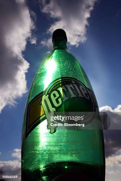 Bottle of Perrier water, produced by Nestle SA, is seen arranged for a photograph in Paris, France, on Friday, Feb. 19, 2010. Nestle, the bottler of...