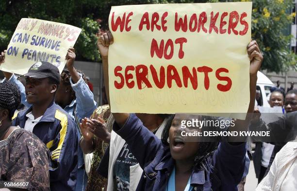 Zimbabwean civil servants demonstrate in the streets of Harare on February 19, 2009. Teachers and other civil servants have been on strike for the...
