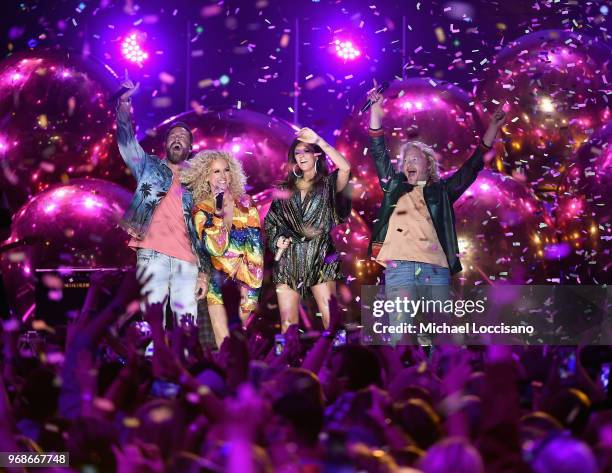 Jimi Westbrook, Kimberly Schlapman, Karen Fairchild and Philip Sweet of band Little Big Town perform onstage at the 2018 CMT Music Awards at...