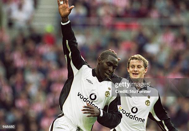 Andy Cole celebrates his goal with team-mate Ole Gunnar Solskjaer of Manchester United during the FA Barclaycard Premiership match against Sunderland...