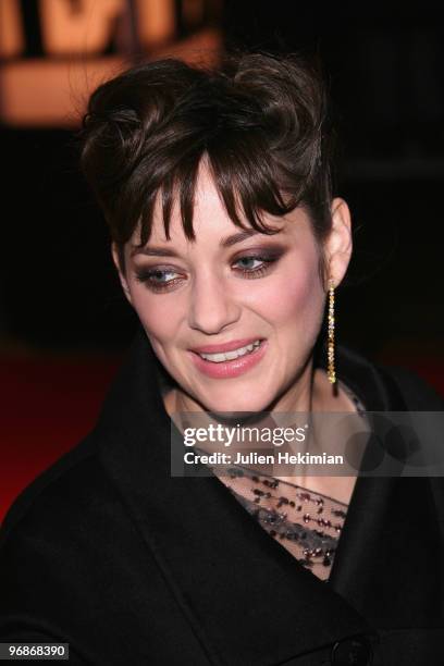 Marion Cotillard leaves the premiere of 'Nine' at Cinema Gaumont Marignan on February 18, 2010 in Paris, France.