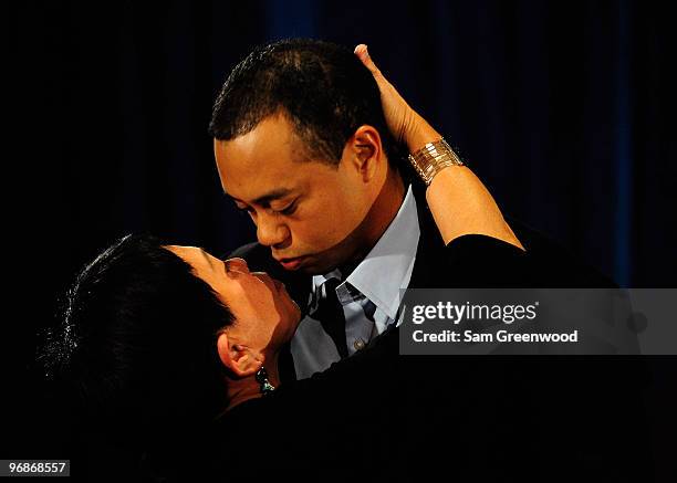 Tiger Woods hugs his mother Kultida following a statement from the Sunset Room on the second floor of the TPC Sawgrass, home of the PGA Tour on...