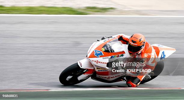 Germany's Moto2 rider Stefan Bradl of Kiefer Racing team negociates a curve during a test session at Catalunya's racetrack in Montmelo, near...