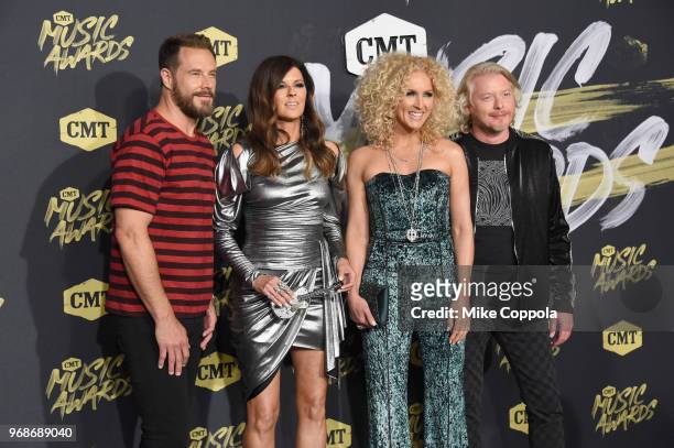 Jimi Westbrook, Karen Fairchild, Kimberly Schlapman and Philip Sweet of musical group Little Big Town attends the 2018 CMT Music Awards at...