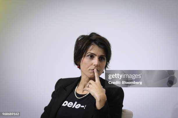 Manuela D'Avila, presidential candidate for the Comunist Party of Brazil , listens during an interview at a 2018 pre-candidates event hosted by the...