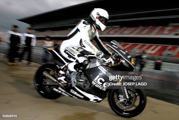 British Moto2 rider Scott Redding of Mvds Team rides during a test session at Catalunya's racetrack in Montmelo, near Barcelona, on February 19,...