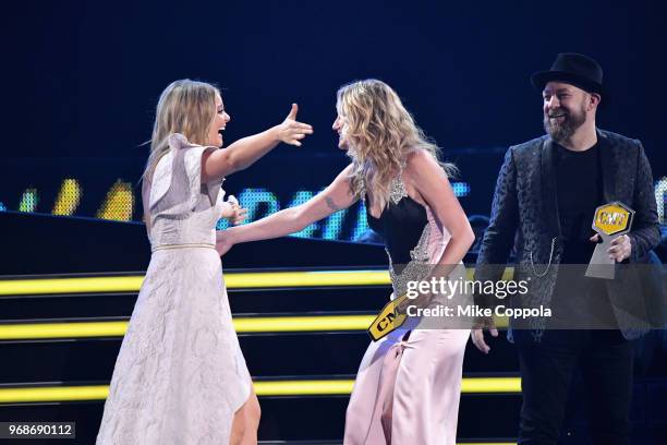 Jennifer Nettles and Kristian Bush of Sugarland present Kane Brown and Lauren Alaina with an award at the 2018 CMT Music Awards at Bridgestone Arena...