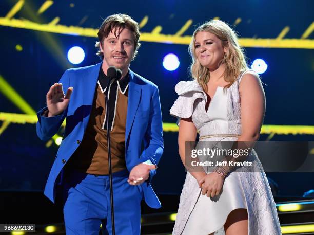 Garrett Hedlund and Lauren Alaina performs onstage at the 2018 CMT Music Awards at Bridgestone Arena on June 6, 2018 in Nashville, Tennessee.