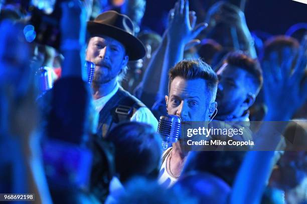 Brian Kelley and Tyler Hubbard of Florida Georgia Line perform onstage at the 2018 CMT Music Awards at Bridgestone Arena on June 6, 2018 in...