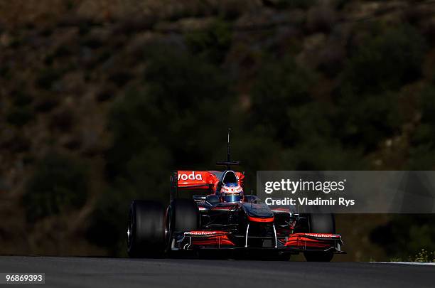 Jenson Button of Great Britain and McLaren Mercedes drives during winter testing at the Circuito De Jerez on February 19, 2010 in Jerez de la...