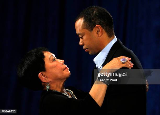 Tiger Woods talks his mother Kultida following a statement from the Sunset Room on the second floor of the TPC Sawgrass, home of the PGA Tour on...