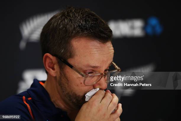 Mike Hesson shows his emotion as he speaks to the media during a New Zealand Cricket press conference on June 7, 2018 in Auckland, New Zealand....