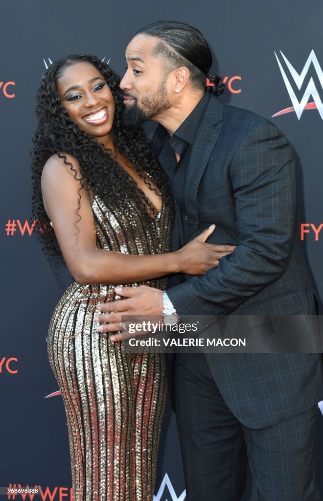 Wrestlers Jimmy Uso and his wife wrestler Naomi arrive at the... News
