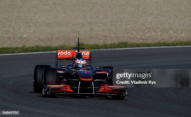 Jenson Button of Great Britain and McLaren Mercedes drives during winter testing at the Circuito De Jerez on February 19, 2010 in Jerez de la...