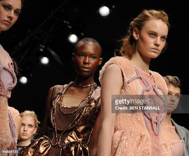 Models walk down the catwalk wearing clothes by Turkey-born designer Bora Aksu for the Autumn/Winter 2010 collection, on the first day of the London...