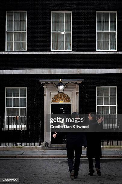 British Prime Minister Gordon Brown walks to number 10 Downing Street with Spanish Prime Minister Jose Luis Rodriguez Zapatero after a meeting on...