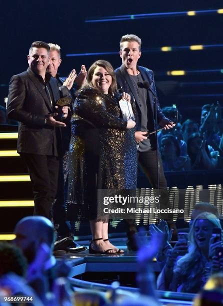 Chrissy Metz and Rascal Flatts speak onstage at the 2018 CMT Music Awards at Bridgestone Arena on June 6, 2018 in Nashville, Tennessee.