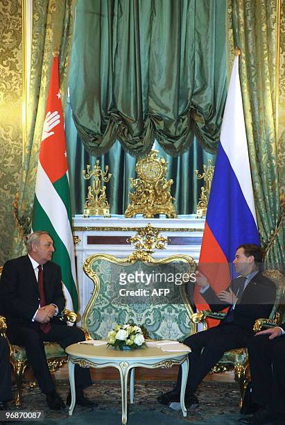 Russian President Dmitry Medvedev speaks with President of Georgia's breakaway Abkhazia region Sergei Bagapsh at the Kremlin in Moscow on February...