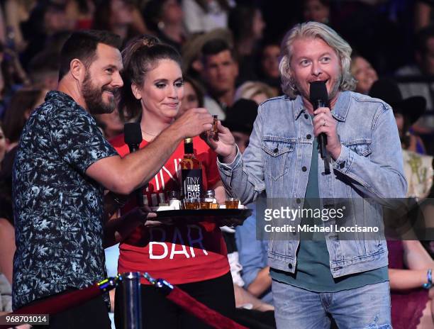 Jimi Westbrook and Philip Sweet of musical group Little Big Town speak at the 2018 CMT Music Awards at Bridgestone Arena on June 6, 2018 in...